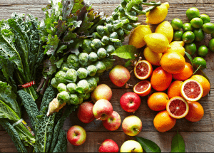 a group of fruits and vegetables on a wood surface Healthy Weight Loss Diets Westminster